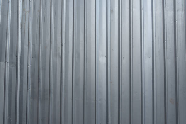 istock The gray corrugated zinc wall on a construction zone. 933362392