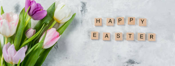 istock Easter concept - cookies with flowers on marble background 933365324