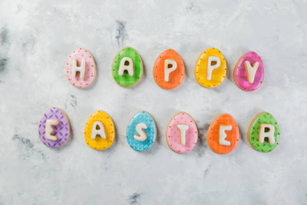istock Easter concept - cookies with flowers on marble background 933365348