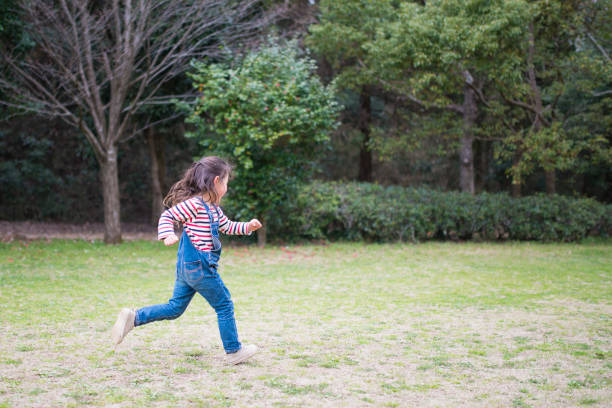 istock Running Little Girl 933365680