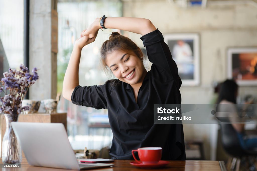 Beautiful Asian woman massage herself to protect an office syndrome, work, health lifestyle concept. Adult Stock Photo