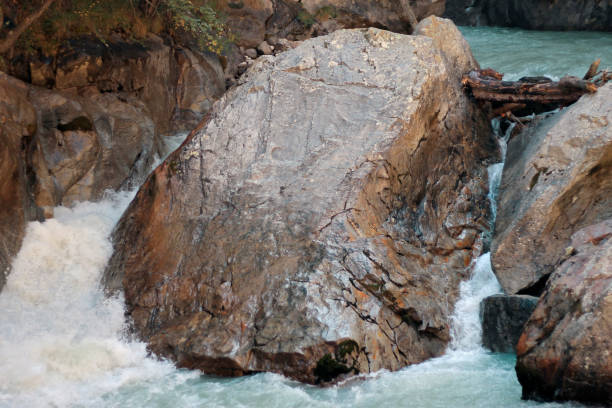 istock Wild mountain river flowing in the canyon 933376238