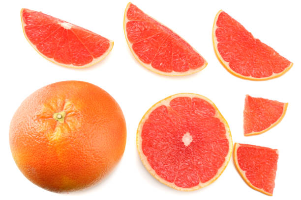 istock healthy food. sliced grapefruit isolated on white background top view 933396596
