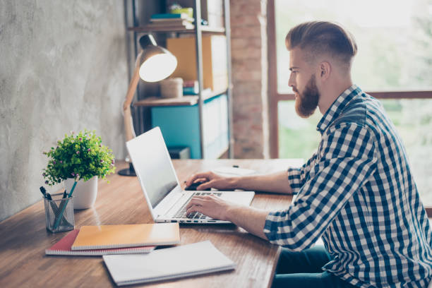 istock Profile side half-faced view portrait of focused planning thinking pensive pondering serious minded calm peaceful smart student learning studying searching analyzing material exams sitting workplace 933402106