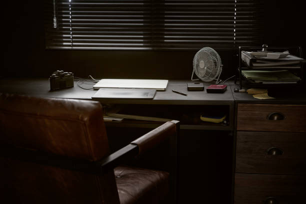 istock Work space on black table of a photographer 933402408