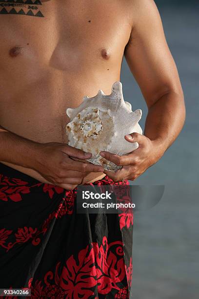 Hawaiian With Seashell Stock Photo - Download Image Now - Adult, Animal Shell, Big Island - Hawaii Islands