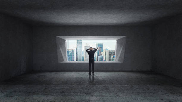 istock Thoughtful businessman standing in empty space concrete room 933404814
