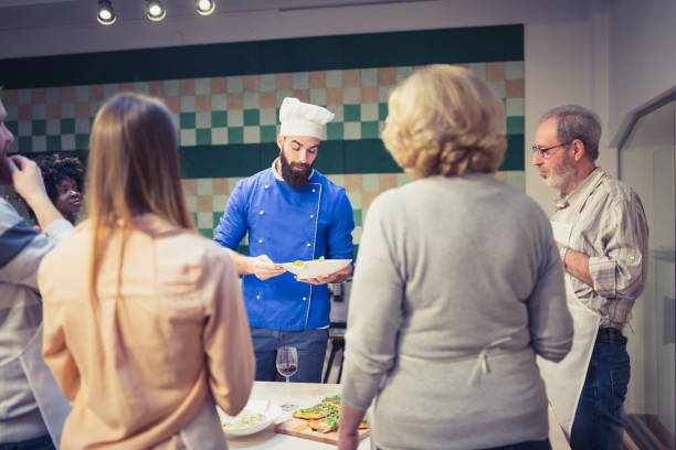 istock People in a cooking class enjoying their time 933407756