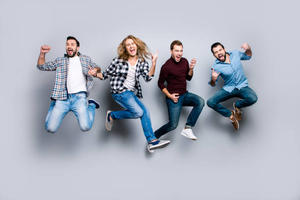 Ethnicity diversity careless freedom people chill hang-out figure playful funny showing symbols concept. Four excited cheerful active carefree men jumping up isolated on gray background Ethnicity diversity careless freedom people chill hang-out figure playful funny showing symbols concept. Four excited cheerful active carefree men jumping up isolated on gray background bachelor stock pictures, royalty-free photos & images