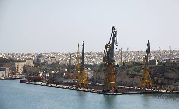 cranes in a drydock stock photo