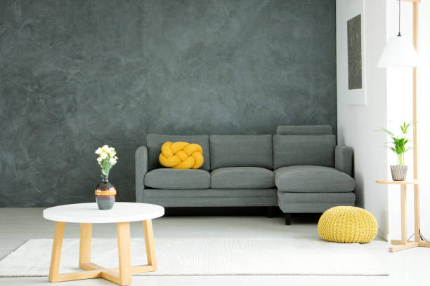 istock Grey and yellow living room 933424792