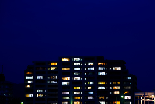 I look at an apartment at night.