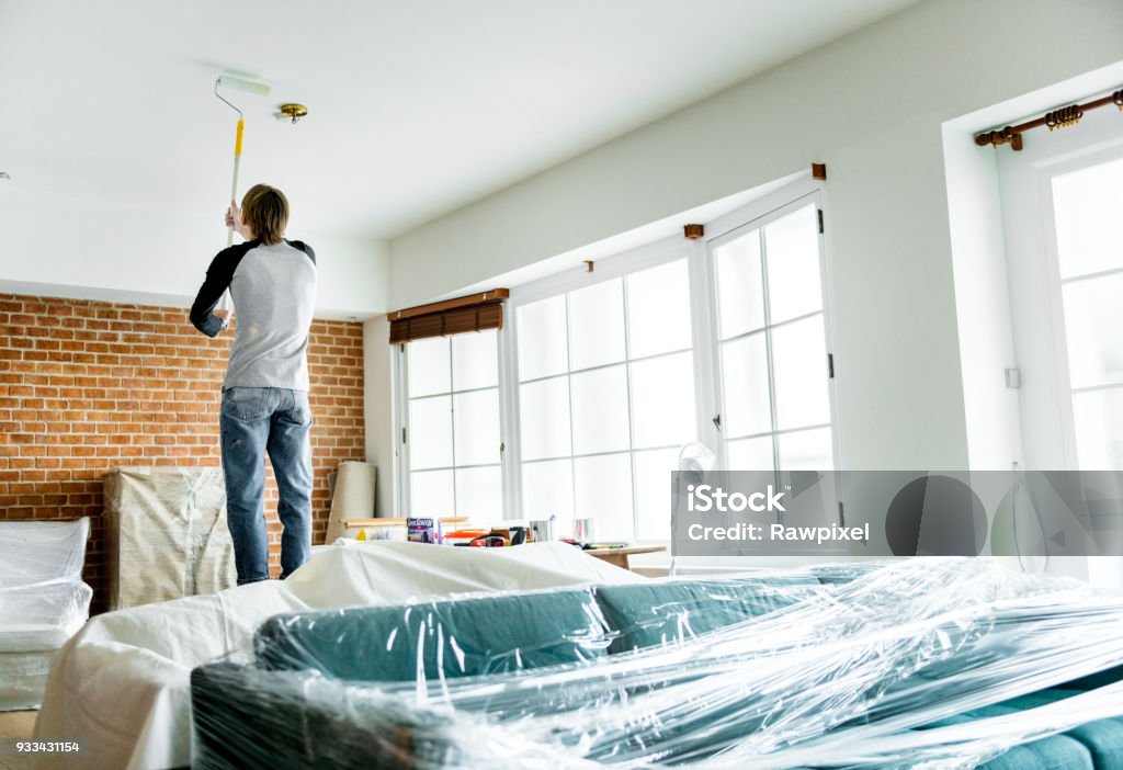 People renovating the house Ceiling Stock Photo