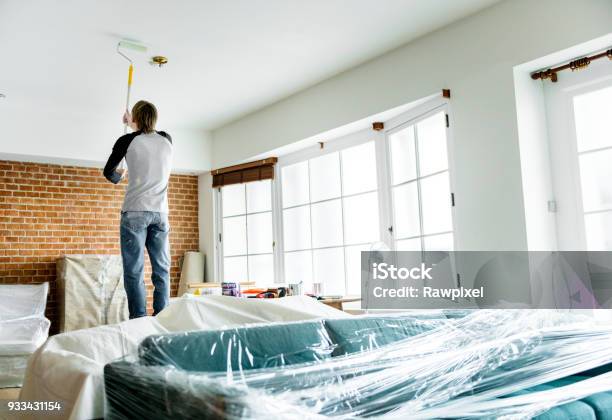 People Renovating The House Stock Photo - Download Image Now - Ceiling, Painting - Activity, Paint