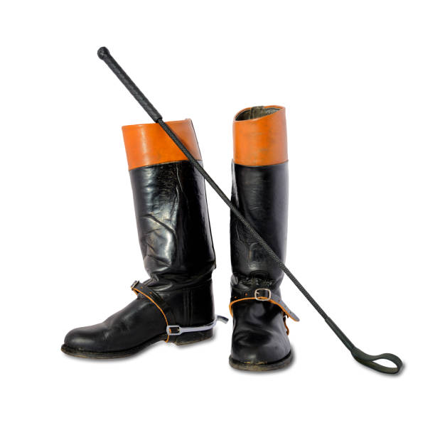 istock Woman used riding boots with spurs and riding crop 933431808