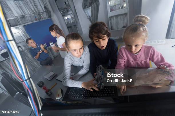 Children Play In The Quest Room Of A Inscrutable Bunker Stock Photo - Download Image Now