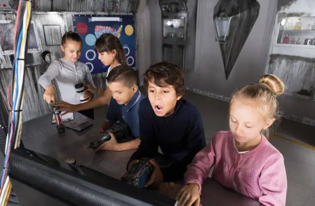 Photo of Children playing in bunker questroom