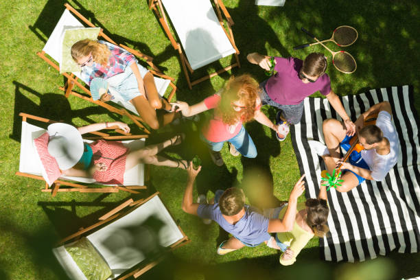 istock Friends dancing to guitar tunes 933435604