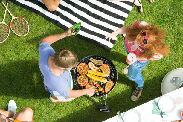 istock Couple enjoying barbecue garden party 933435628