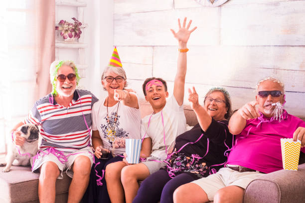 istock part at home for mixed group of people with different ages 933442336