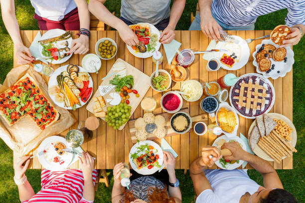 istock Group of friends eating pizza 933445826
