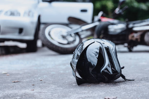 Black biker helmet on street stock photo