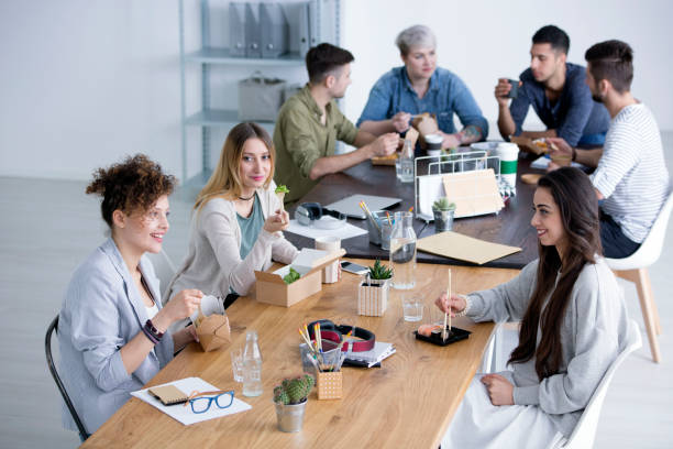 istock Smiling women eating lunch 933454244
