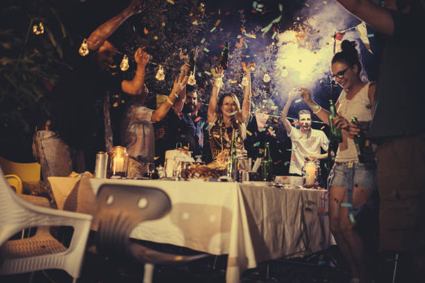 istock Friends having fun at birthday party 933455030