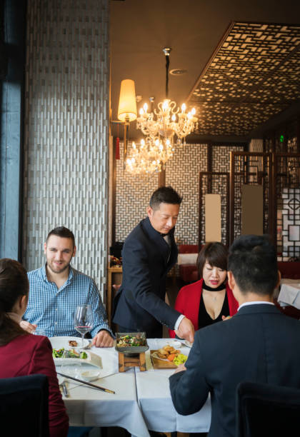 istock Friends in Chinese restaurant 933456050