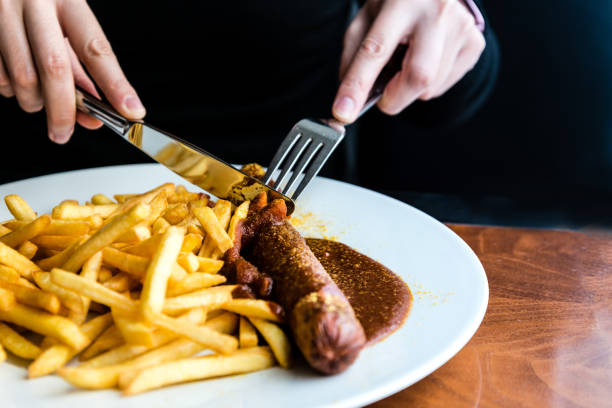 istock Tasty german sausage served with sauce 933457380