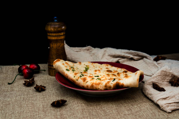 istock traditional Indian Naan garlic bread 933458012