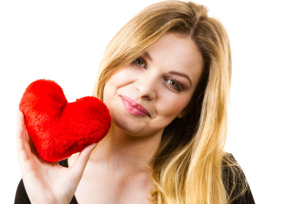 istock Woman holding red heart 933463128