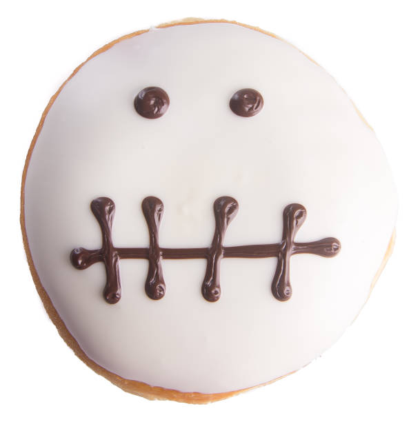 istock donut. halloween donut on a background 933465640