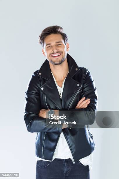 Portrait Of Cheerful Handsome Man Wearing Leather Jacket Stock Photo - Download Image Now