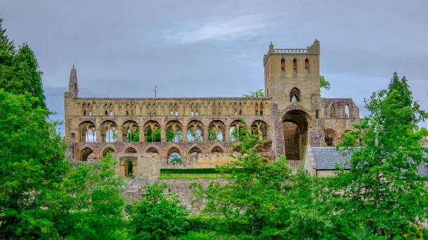 Jedburgh Abbey, a ruined Augustinian abbey founded in the 12th century in the Scottish Borders. Now it is one of the abbeys that are worth a visit on the Borders Abbeys Way walk. Scotland