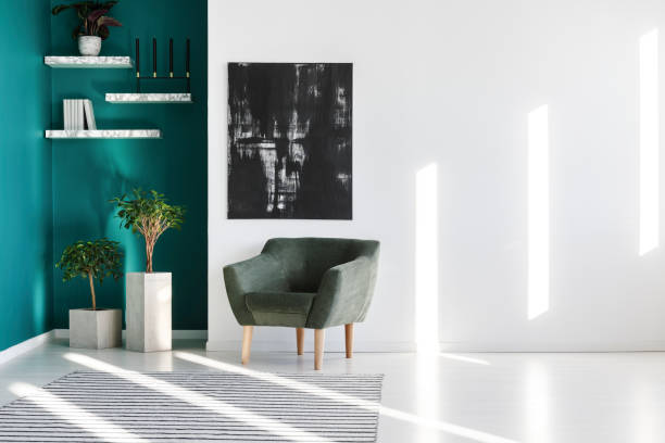 istock Armchair, plants and painting 933470700