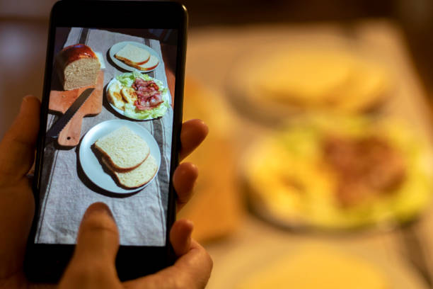 istock take photo of bread with mobile phone 933471086
