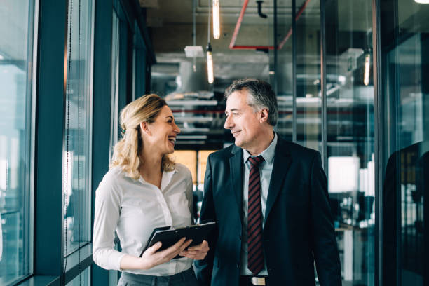 istock Cheerful business colleagues 933479464