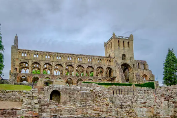 Jedburgh Abbey, a ruined Augustinian abbey founded in the 12th century in the Scottish Borders. Now it is one of the abbeys that are worth a visit on the Borders Abbeys Way walk. Scotland