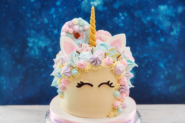 istock Colorful cake in shape of unicorn face 933483408