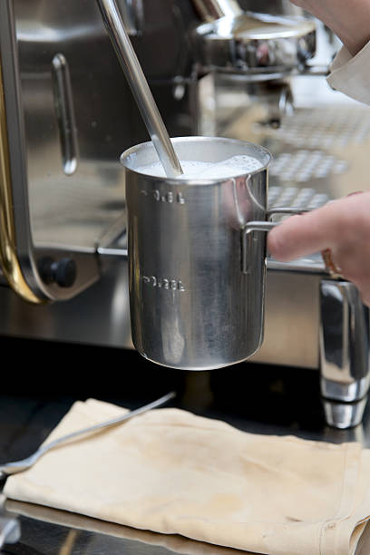 istock Steaming froth for preparing espresso latte 93349085