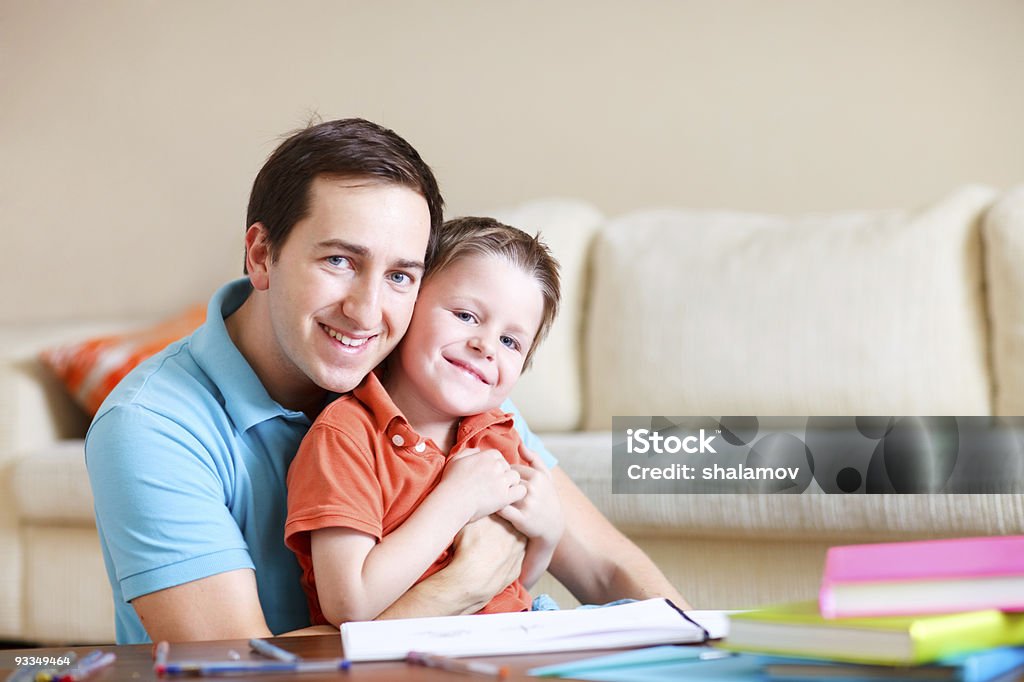 Father and son at home  Adult Stock Photo