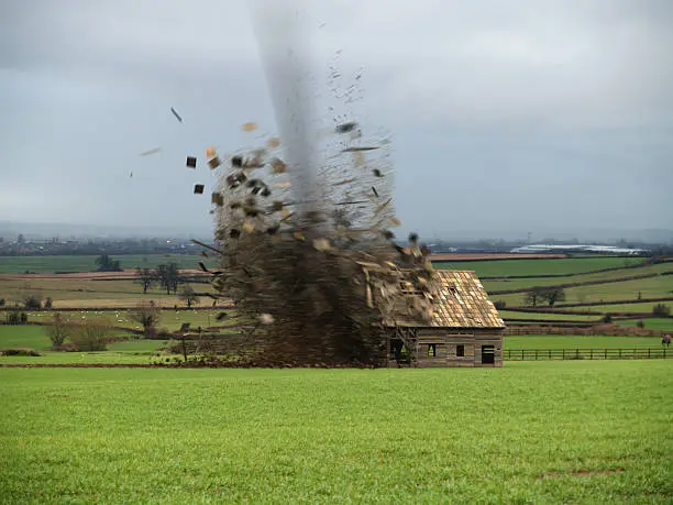 Photo of Tornado Destroying Barn