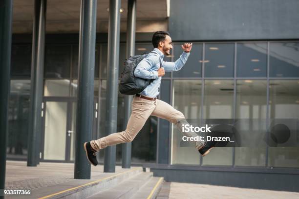 Businessman Is Running To Catch The Train Stock Photo - Download Image Now - Jumping, Running, Occupation