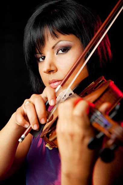 istock young female violinist 93354519