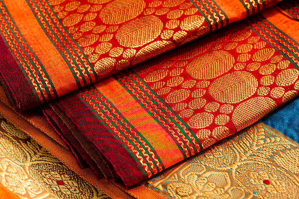 Indian saris Indian silk saries close up. BackgroundIndian silk saries close up sari stock pictures, royalty-free photos & images