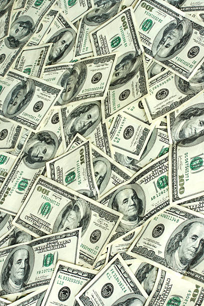 istock Background of hundred dollars bank notes 93355132