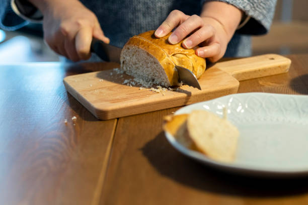 istock cutting homemade bun to slices 933558004