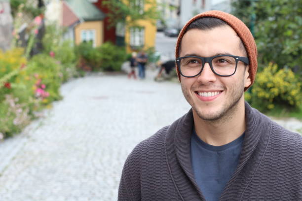 istock Cute hipster smiling outdoors close up 933562250