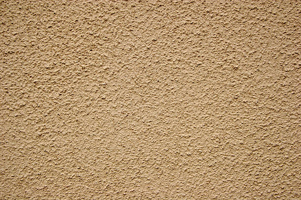 plaster building compo, exterior stucco,  textured background stock photo